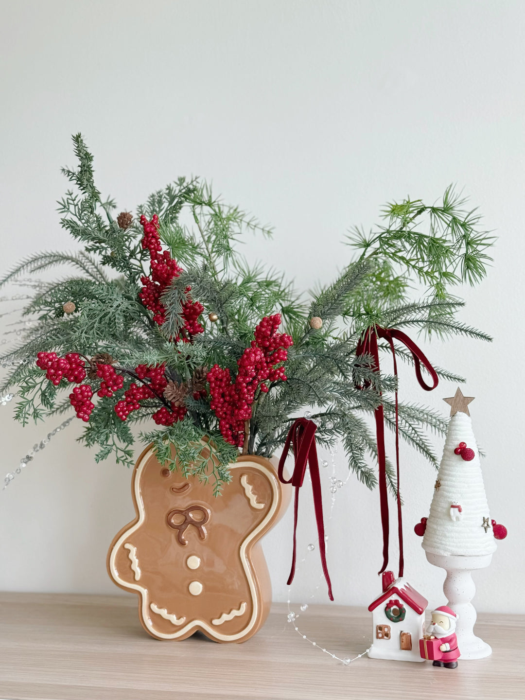 Berry Merry Holiday Arrangement in Gingerbread Man Vase (1-sided)