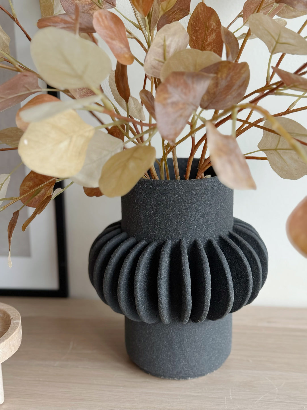 Sleek Black Petal Elegance Speckled Porcelain Vase