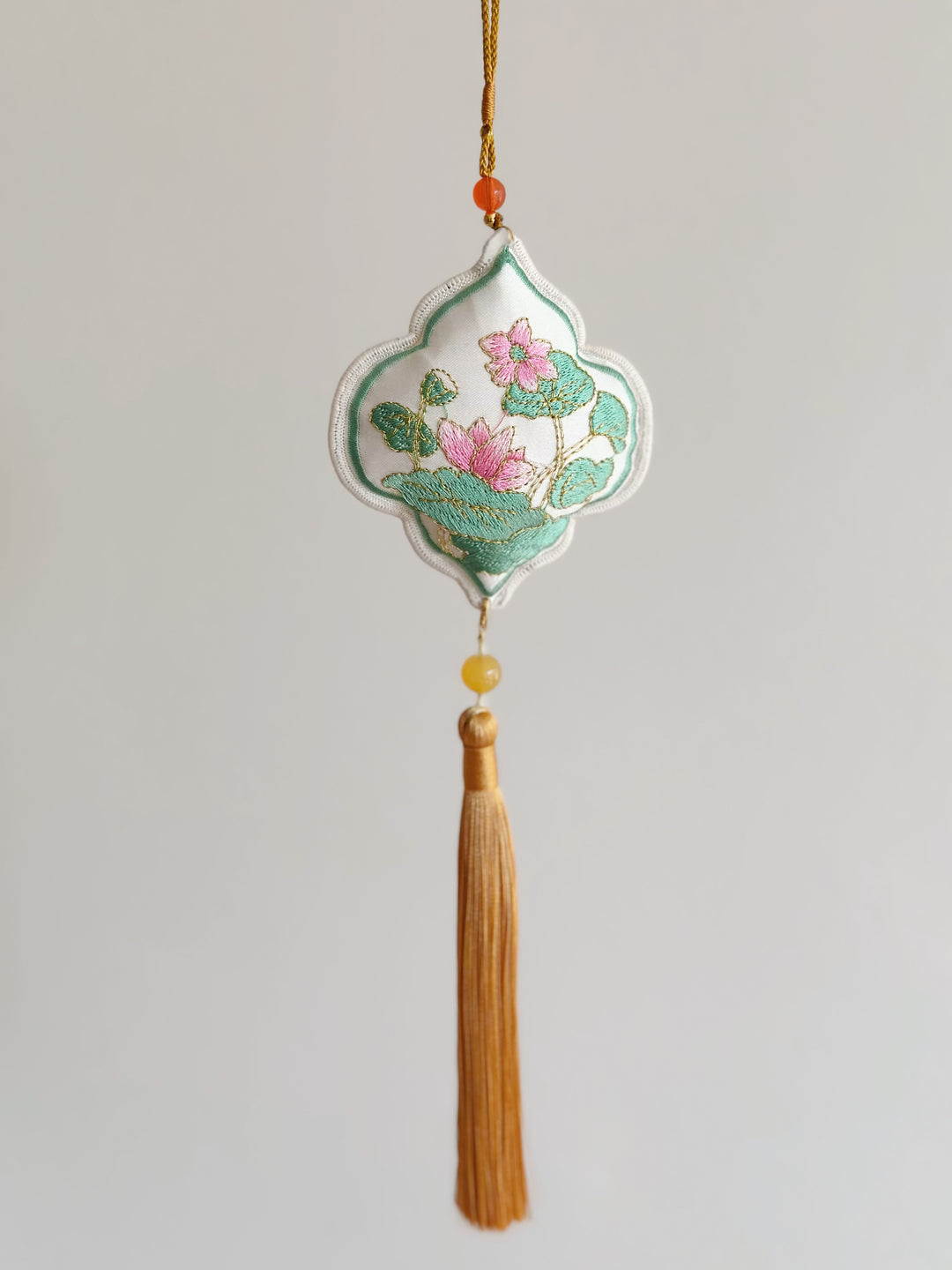 Lotus Serenity Tassel Charm