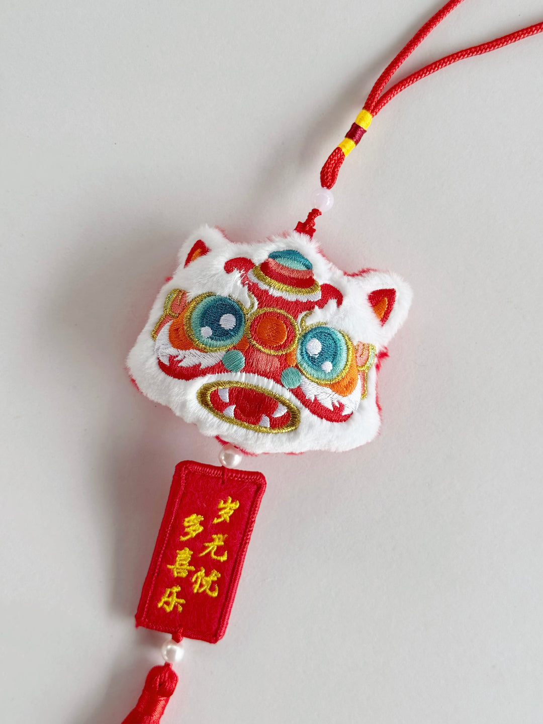 Joyful Lion Head Tassel Charm