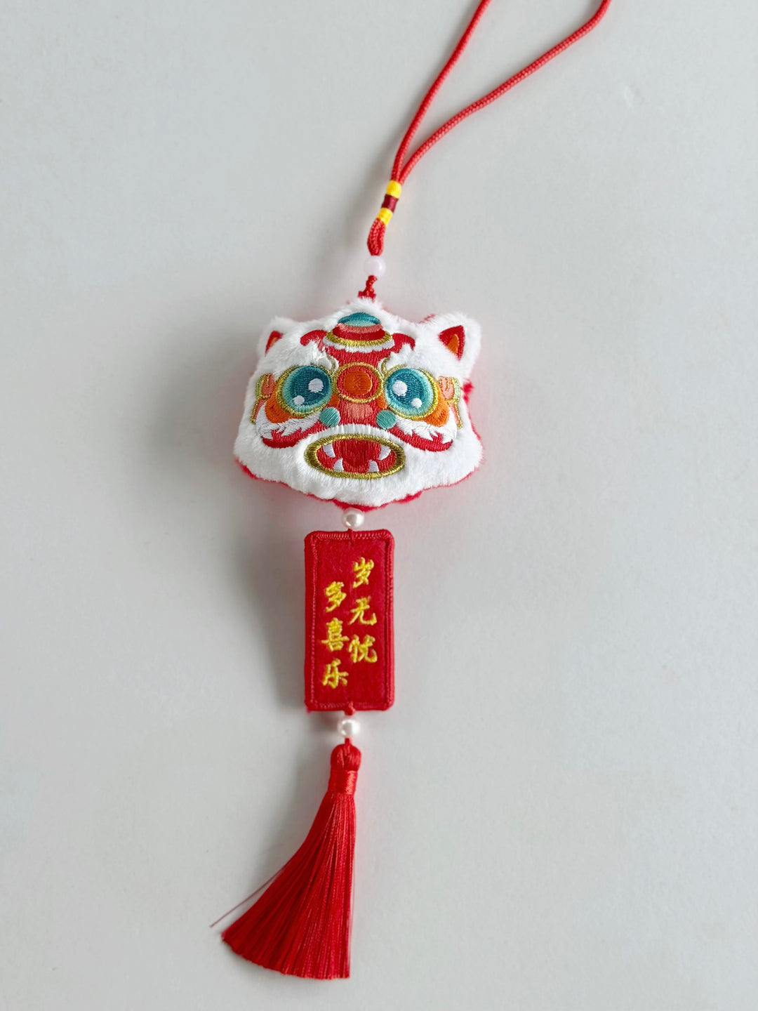 Joyful Lion Head Tassel Charm