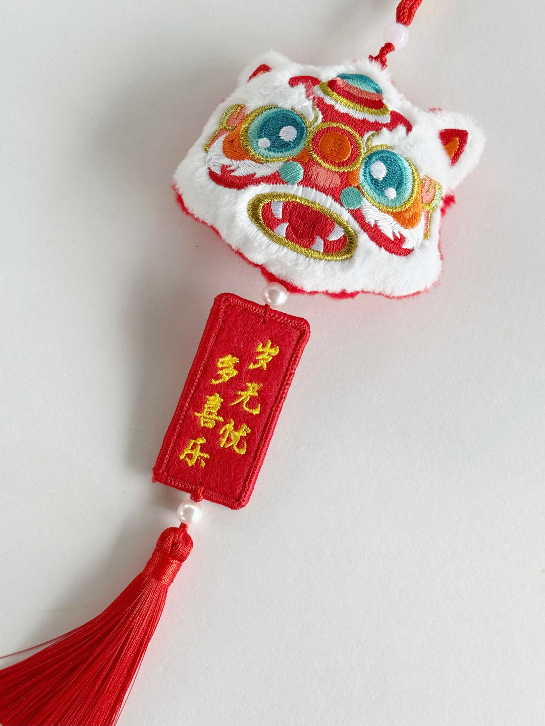 Joyful Lion Head Tassel Charm