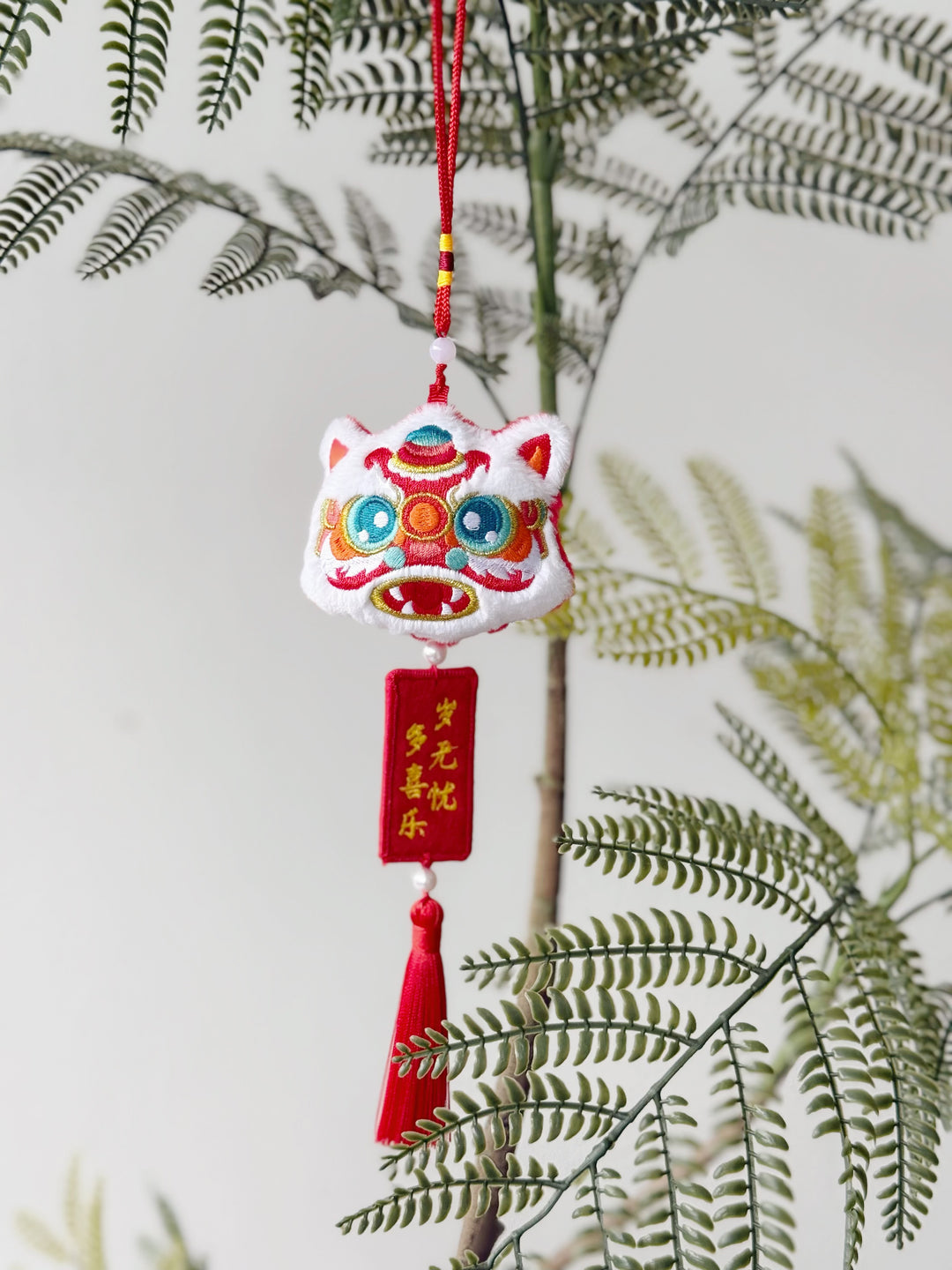 Joyful Lion Head Tassel Charm