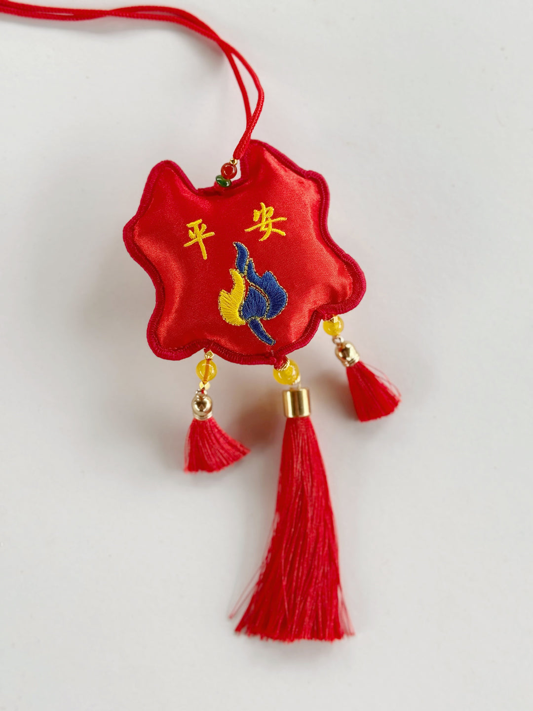 Peace & Joy Lion Tassel Charm
