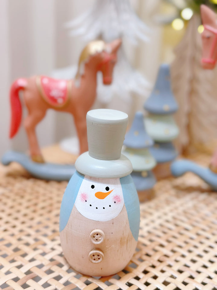 Whimsical Woodland: Pastel-Hued Wooden Christmas Ensemble