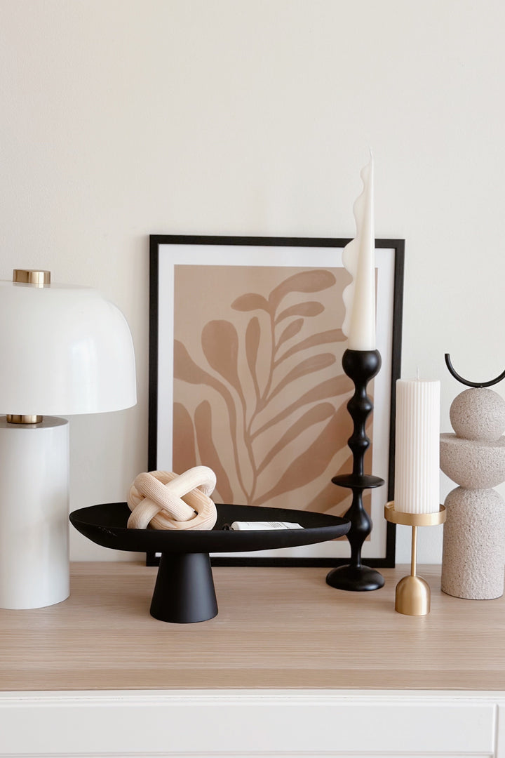 Sleek Black Leaf on Pedestal